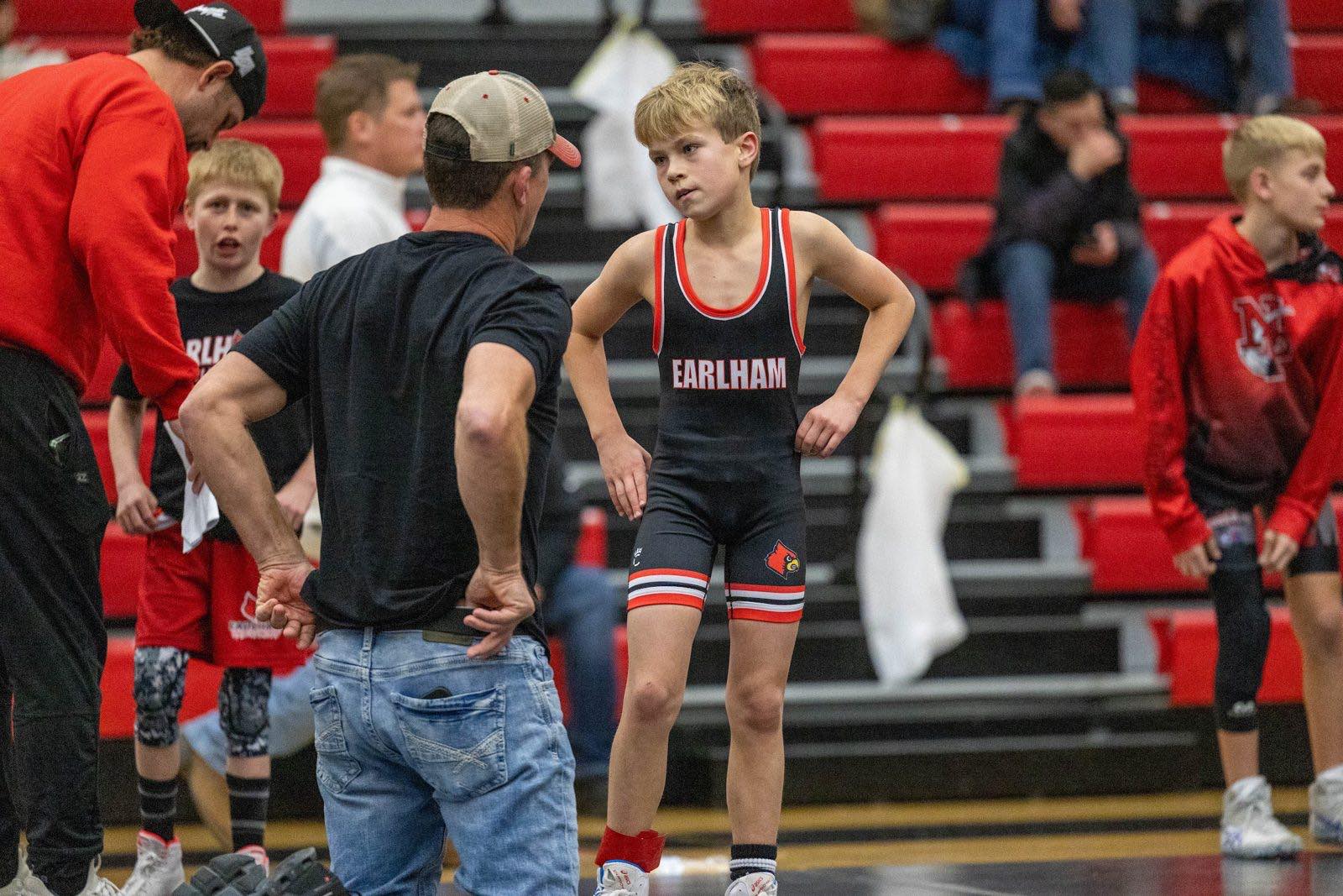 Coach Christensen with an Earlham wrestler