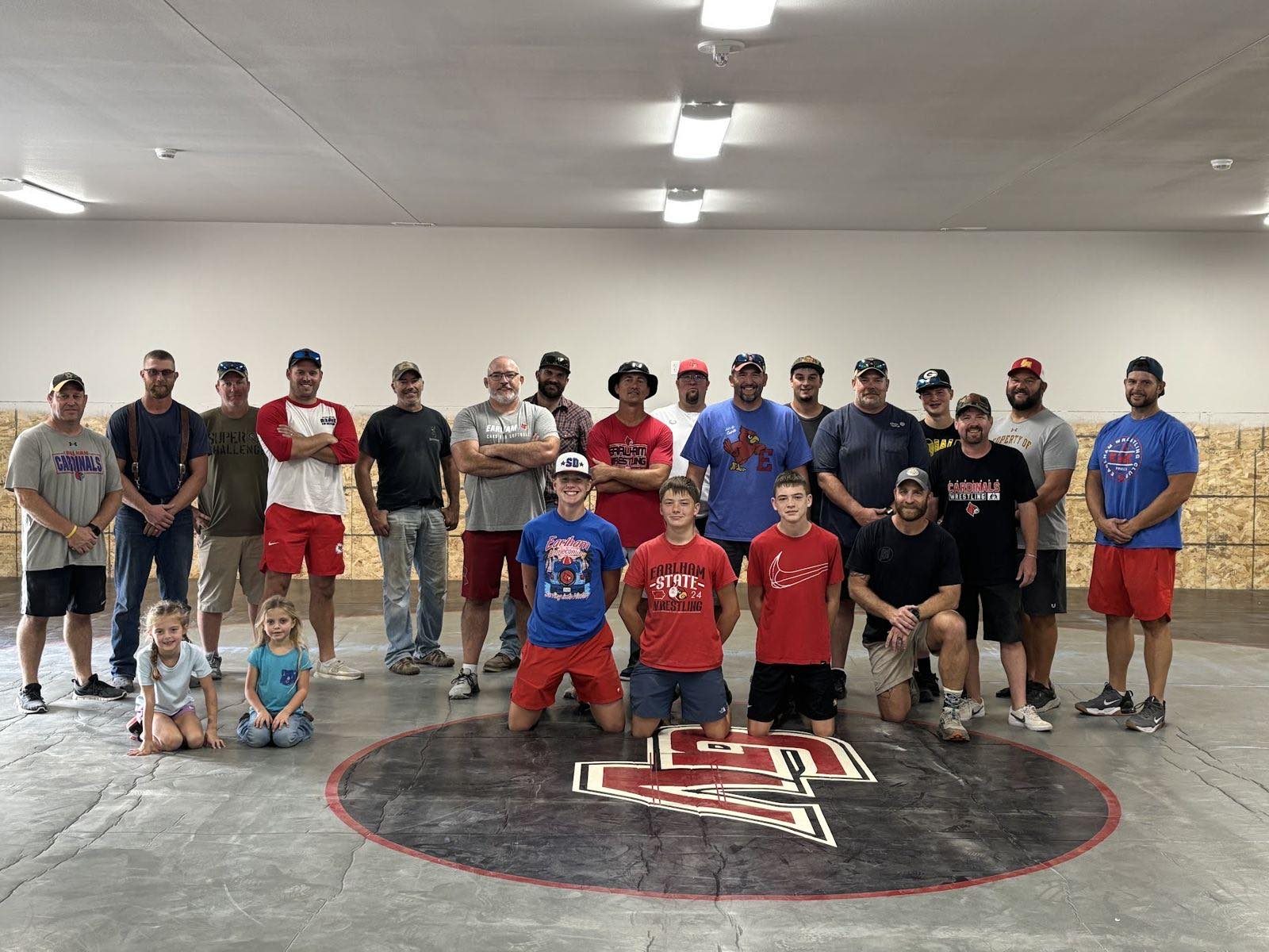 Earlham Wrestling volunteers in the wrestling room