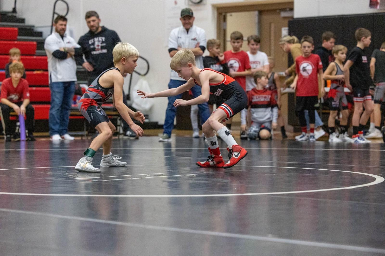 Two Earlham youth wrestlers in neutral stance